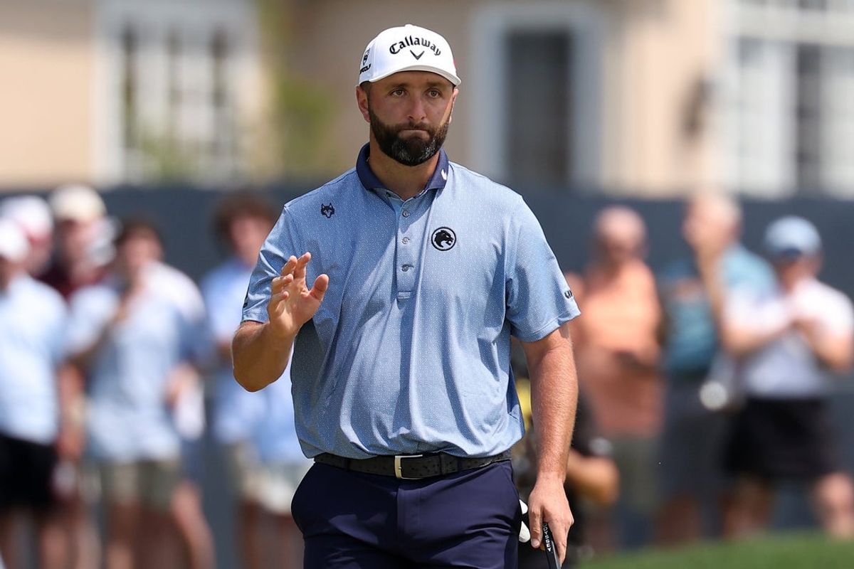 May 17, 2026; Newtown Square, Pennsylvania, USA; Jon Rahm plays on the first hole during the final round of the PGA Championship golf tournament. Mandatory Credit: Bill Streicher-Imagn Images