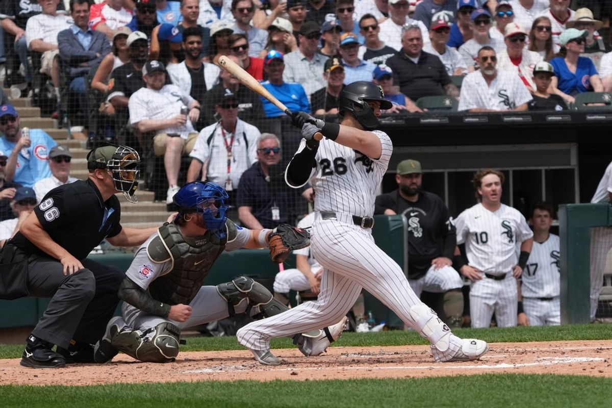 May 17, 2026; Chicago, Illinois, USA; Chicago White Sox catcher Edgar Quero (26) hits a one run single against the Chicago Cubs during the second inning at Rate Field. Mandatory Credit: David Banks-Imagn Images