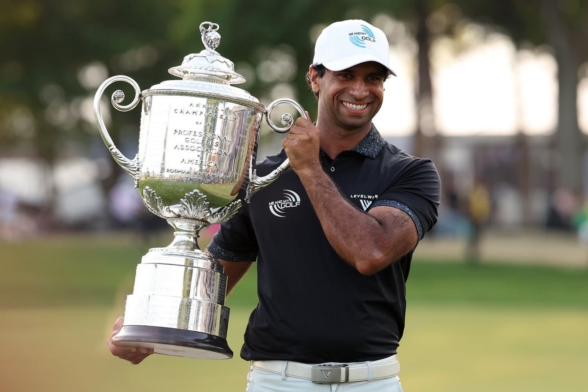 May 17, 2026; Newtown Square, Pennsylvania, USA; Aaron Rai poses with the trophy after winning the final round of the PGA Championship golf tournament. Mandatory Credit: Bill Streicher-Imagn Images