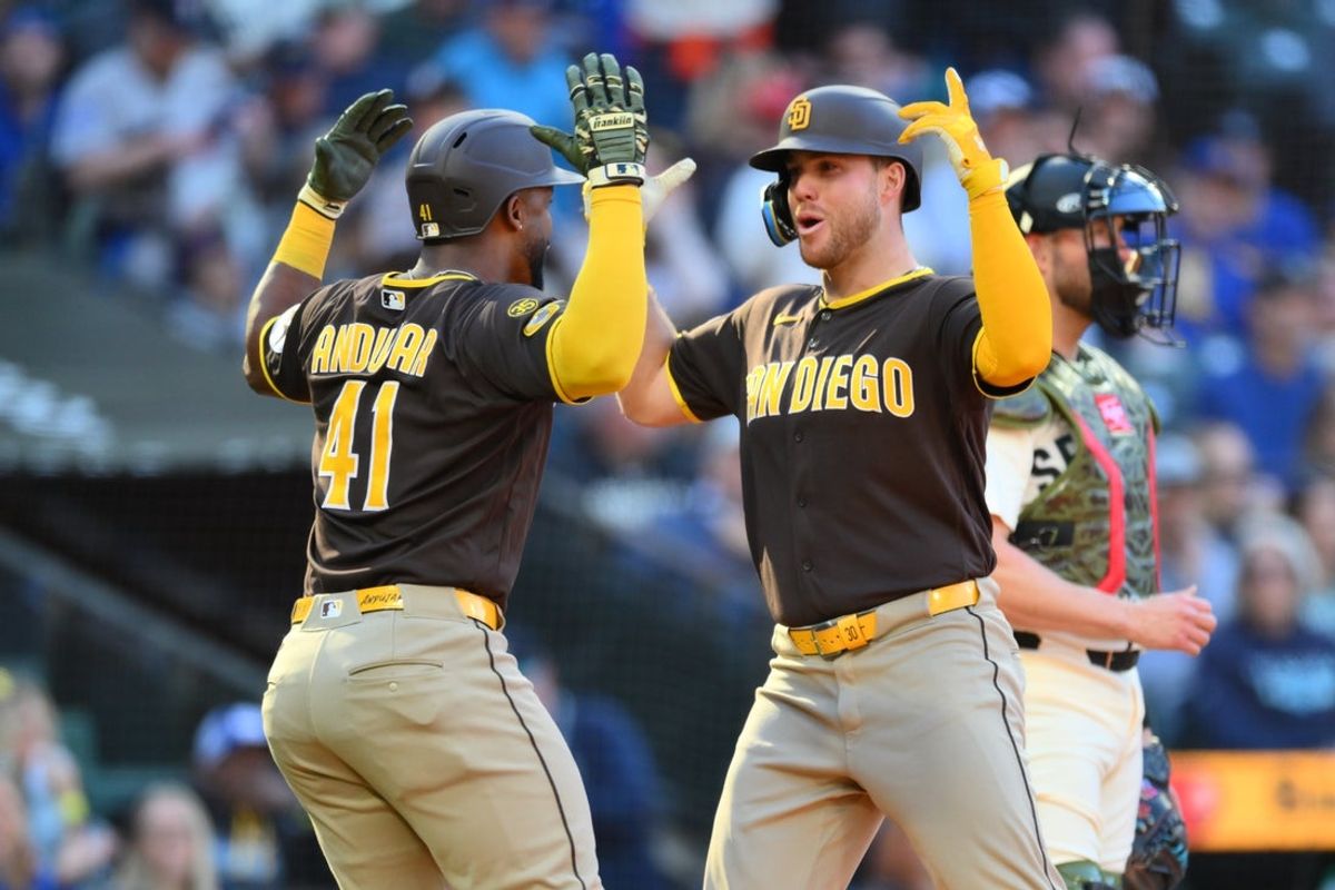 May 17, 2026; Seattle, Washington, USA; San Diego Padres third baseman Miguel Andujar (41) and left fielder Gavin Sheets (30) celebrate after Sheets hit a 2-run home run against the Seattle Mariners during the sixth inning at T-Mobile Park. Mandatory Credit: Steven Bisig-Imagn Images