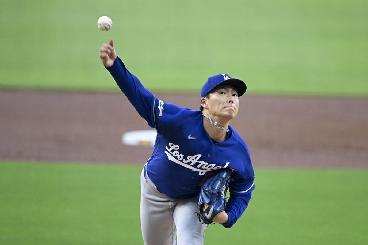 May 18, 2026; San Diego, California, USA; Los Angeles Dodgers pitcher Yoshinobu Yamamoto (18) throws a pitch during the first inning against the San Diego Padres at Petco Park. Mandatory Credit: Denis Poroy-Imagn Images