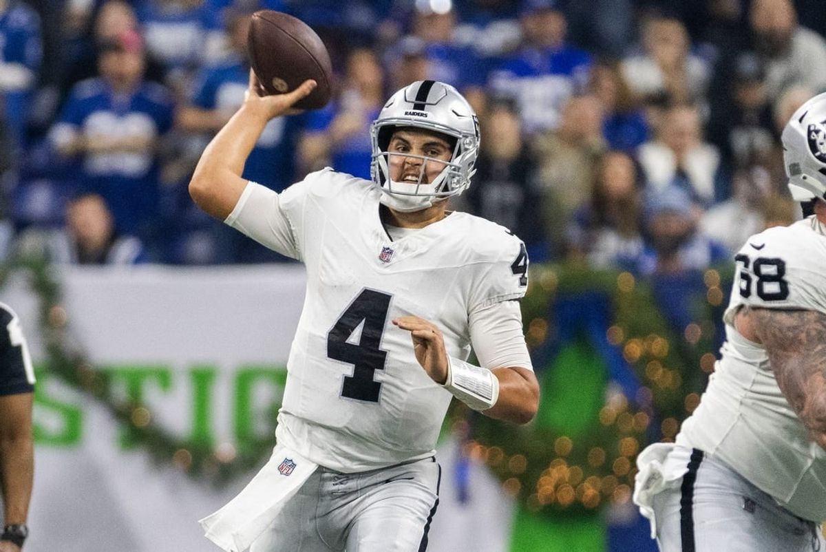 Dec 31, 2023; Indianapolis, Indiana, USA; Las Vegas Raiders quarterback Aidan O'Connell (4) passes the ball  in the first half against the Indianapolis Colts at Lucas Oil Stadium.