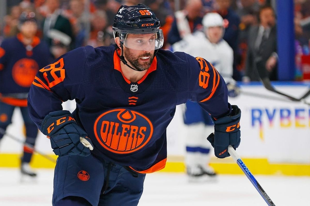 Dec 14, 2023; Edmonton, Alberta, CAN; Edmonton Oilers forward Sam Gagner (89) chases a loose puck against the Tampa Bay Lightning at Rogers Place.