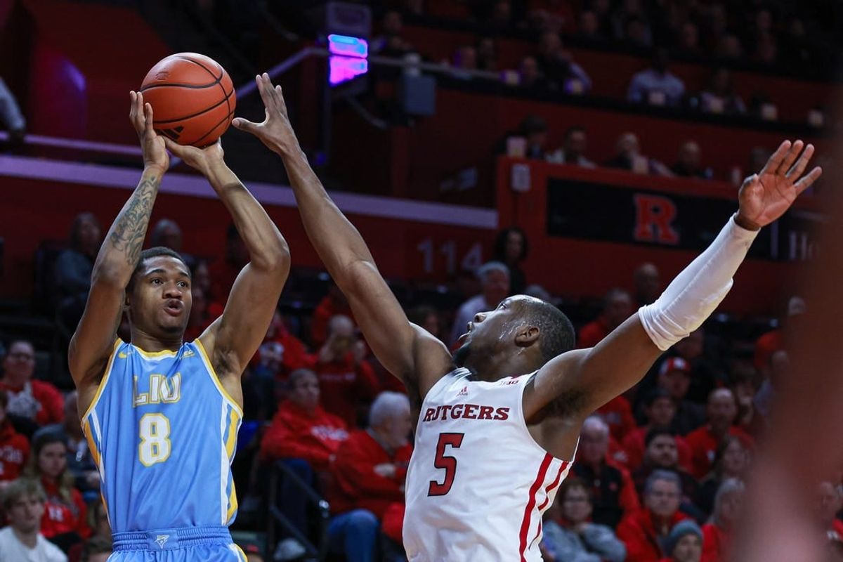 Dec 16, 2023; Piscataway, New Jersey, USA; Long Island Sharks forward Jason Steele (8) shoots the ball as Rutgers Scarlet Knights forward Aundre Hyatt (5) defends during the first half at Jersey Mike's Arena.