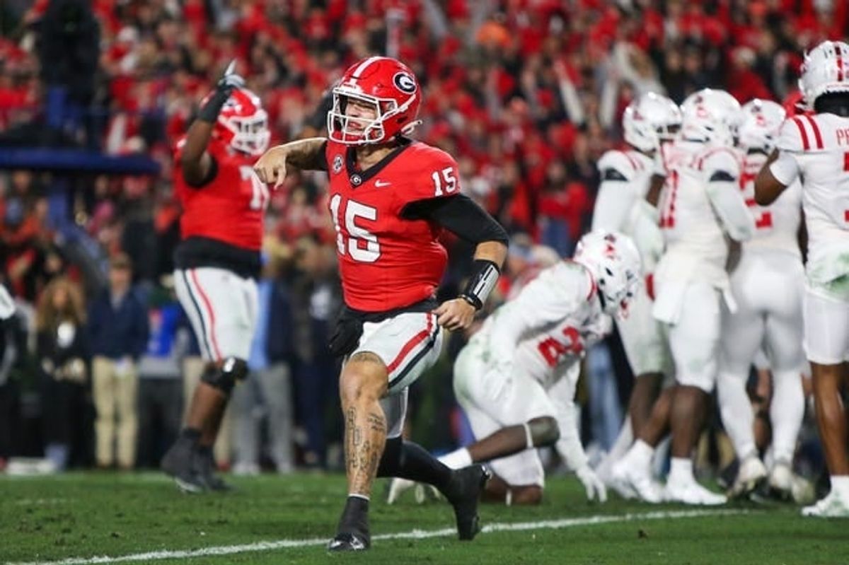 Nov 11, 2023; Athens, Georgia, USA; Georgia Bulldogs quarterback Carson Beck (15) celebrates after a touchdown against the Mississippi Rebels in the second quarter at Sanford Stadium.
