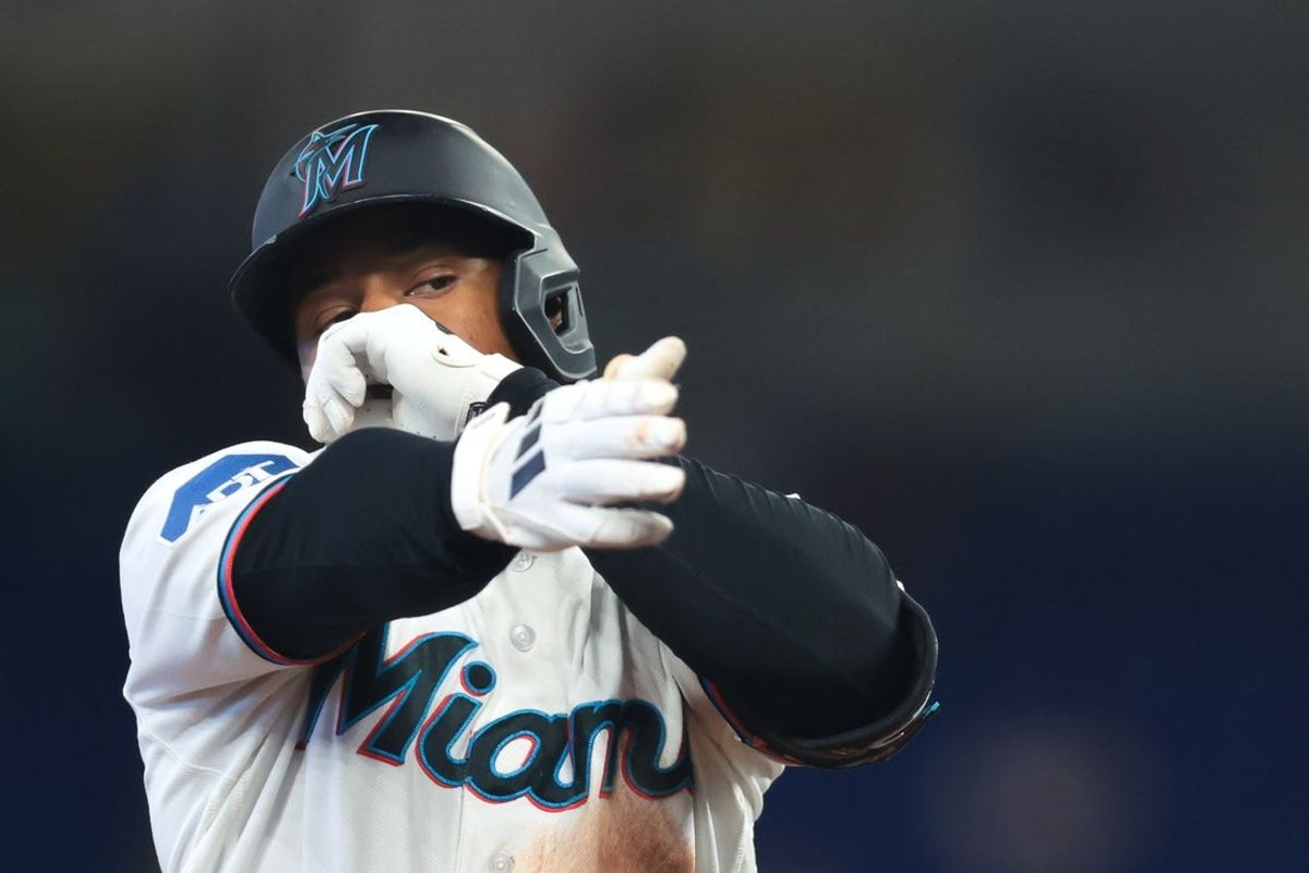 May 19, 2026; Miami, Florida, USA; Miami Marlins second baseman Xavier Edwards (9) reacts after hitting a home run against the Atlanta Braves during the first inning at loanDepot Park. Mandatory Credit: Sam Navarro-Imagn Images
