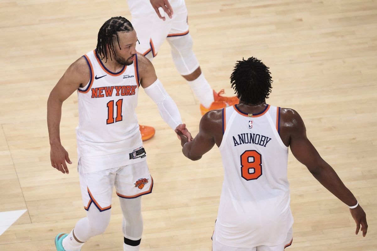 May 19, 2026; New York, New York, USA; New York Knicks guard Jalen Brunson (11) celebrates with forward Og Anunoby (8) after defeating the Cleveland Cavaliers in overtime of game one of the eastern conference finals for the 2026 NBA playoffs at Madison Square Garden. Mandatory Credit: Vincent Carchietta-Imagn Images
