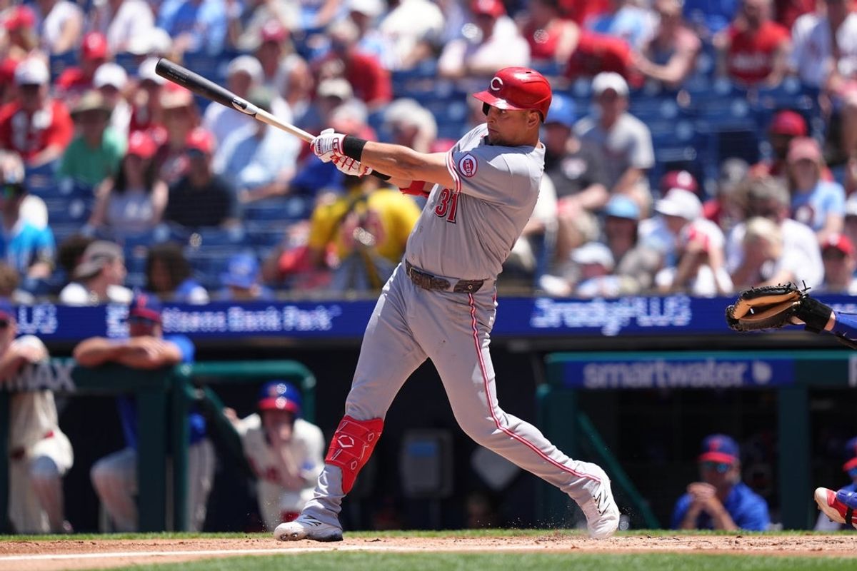 May 20, 2026; Philadelphia, Pennsylvania, USA; Cincinnati Reds infielder Nathaniel Lowe (31) hits an RBI double against the Philadelphia Phillies in the second inning at Citizens Bank Park. Mandatory Credit: Kyle Ross-Imagn Images