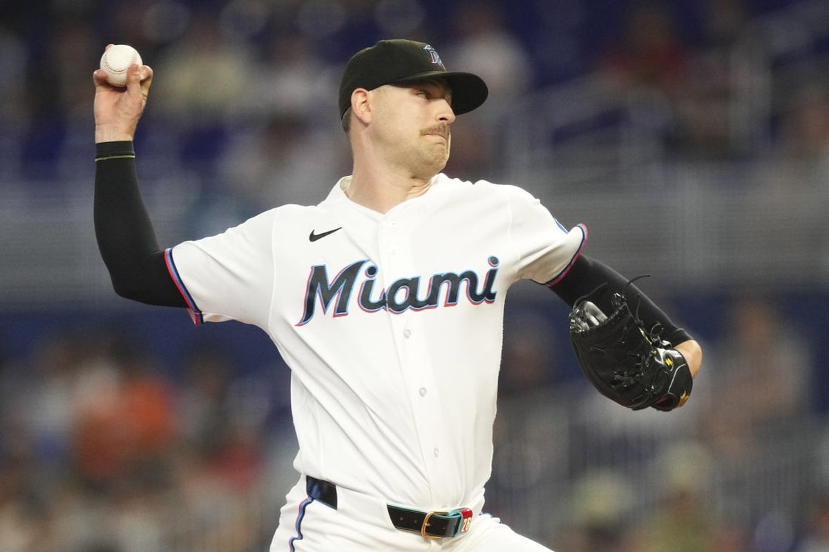 May 20, 2026; Miami, Florida, USA;  Miami Marlins starting pitcher Janson Junk (26) throws in the first inning against the Atlanta Braves at loanDepot Park. Mandatory Credit: Jim Rassol-Imagn Images