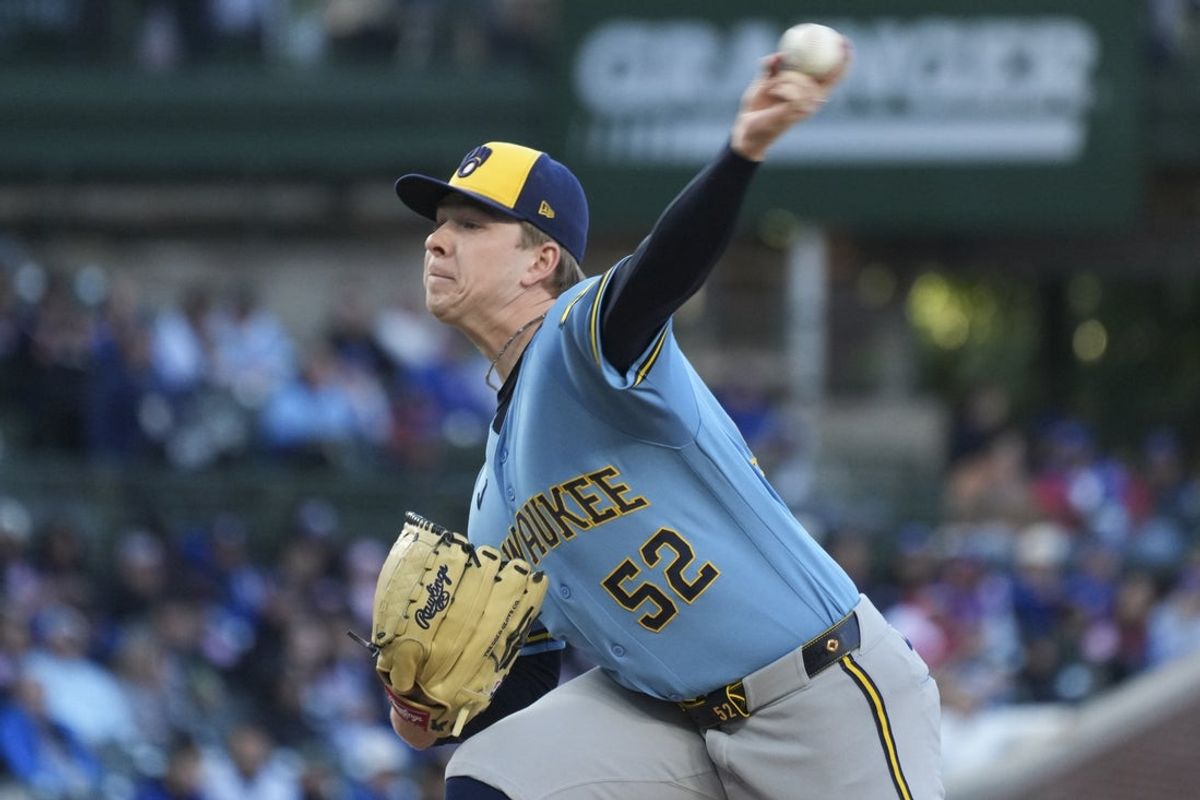 May 20, 2026; Chicago, Illinois, USA; Milwaukee Brewers pitcher Kyle Harrison (52) throws the ball against the Chicago Cubs during the first inning at Wrigley Field. Mandatory Credit: David Banks-Imagn Images