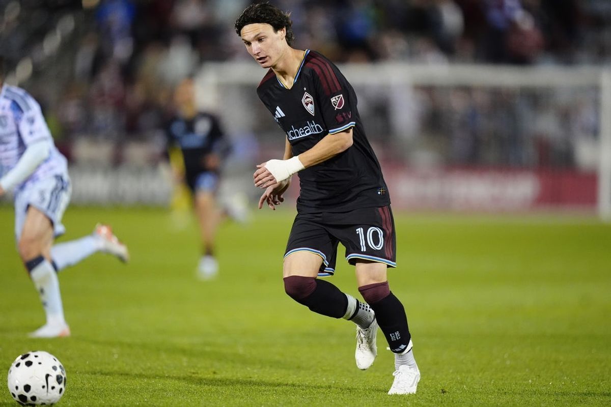 May 20, 2026; Commerce City, CO, USA; Colorado Rapids midfielder Paxten Aaronson (10) controls the ball in the second half against the San Jose Earthquakes at DICK's Sporting Goods Park. Mandatory Credit: Ron Chenoy-Imagn Images
