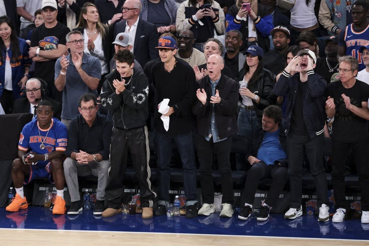 Celebrities Tracy Morgan, Timothee Chalamet, Michael J. Fox and Ben Stiller react during the fourth quarter of Game 2 of the 2026 Eastern Conference finals at Madison Square Garden in New York.
