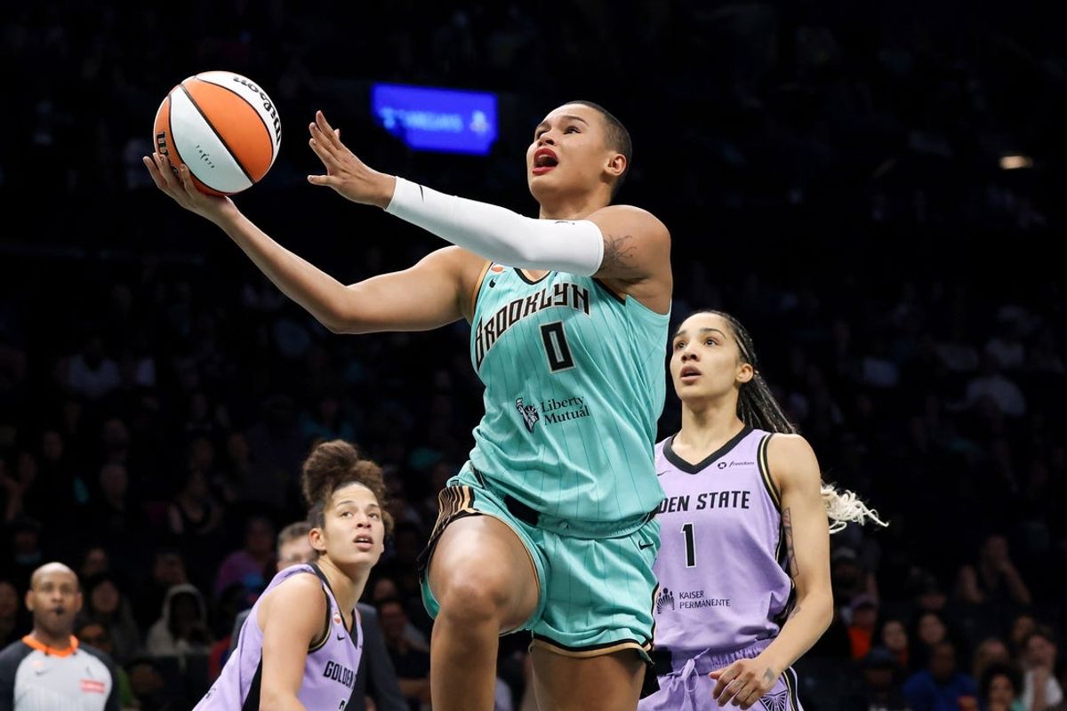 May 21, 2026; Brooklyn, New York, USA; New York Liberty forward Satou Sabally (0) drives to the basket against Golden State Valkyries forward Gabby Williams (1) during the second half at Barclays Center. Mandatory Credit: Tom Horak-Imagn Images