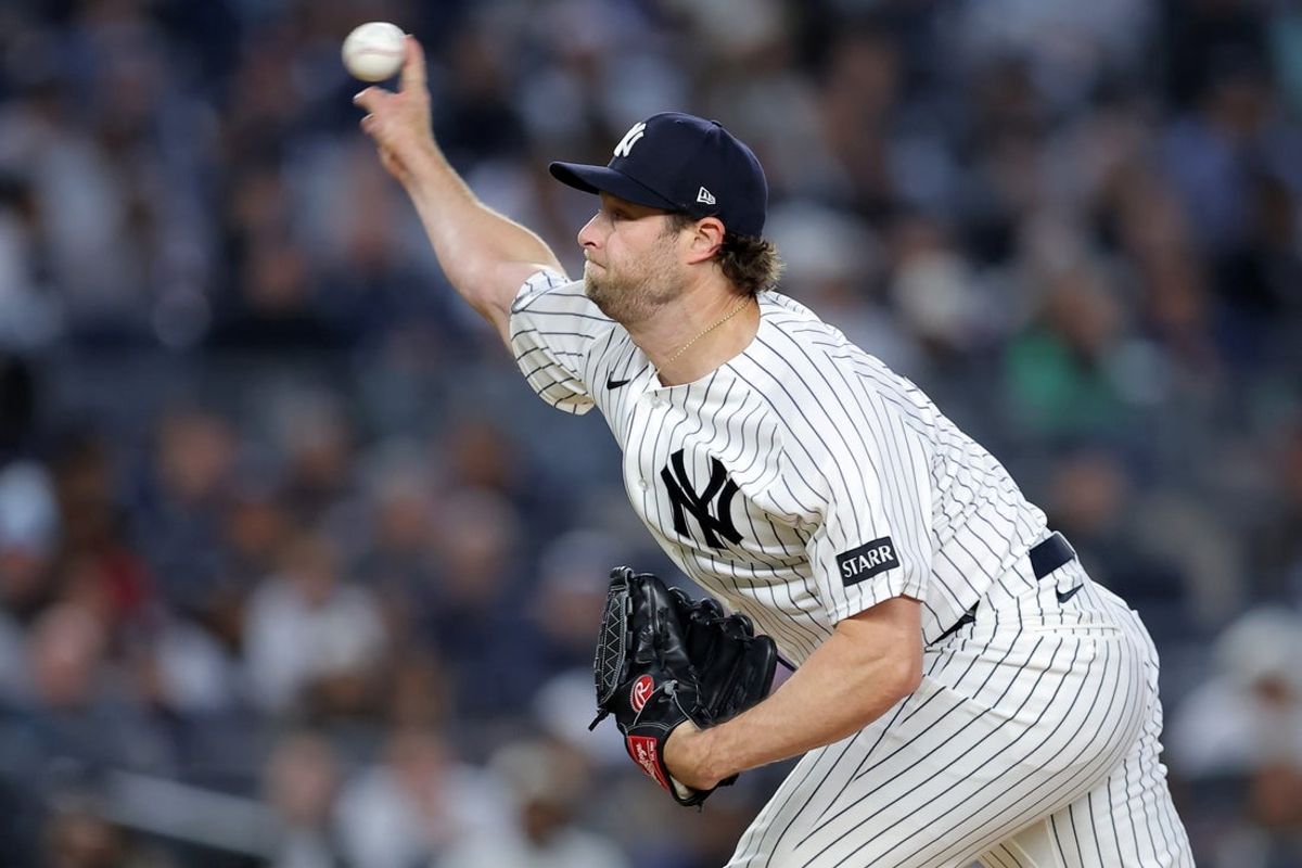 May 22, 2026; Bronx, New York, USA; New York Yankees starting pitcher Gerrit Cole (45) pitches against the Tampa Bay Rays during the fifth inning at Yankee Stadium. Mandatory Credit: Brad Penner-Imagn Images