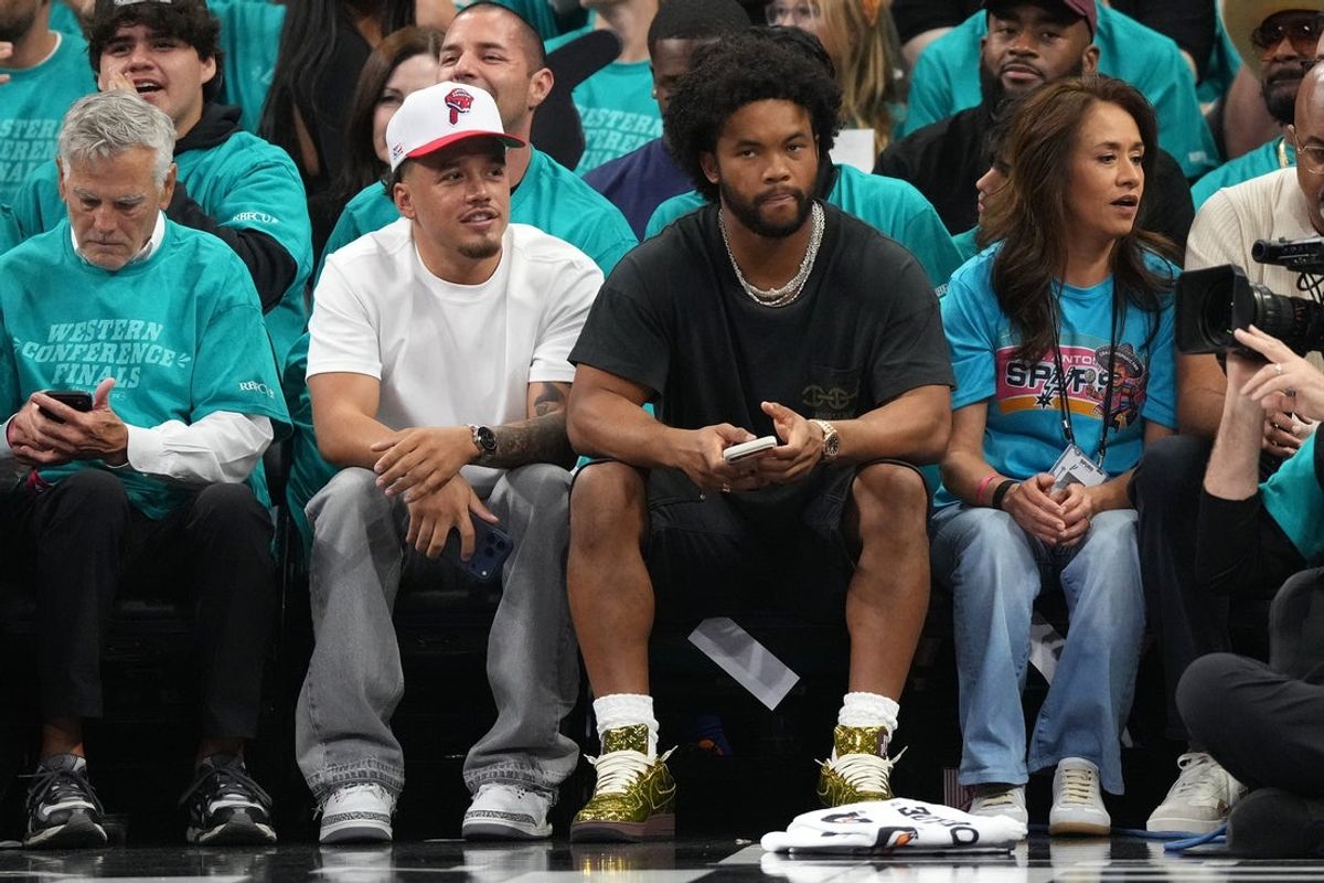 May 22, 2026; San Antonio, Texas, USA; Minnesota Vikings quarterback Kyler Murray watches the game in the first half during game three of the western conference finals for the 2026 NBA playoffs at Frost Bank Center. Mandatory Credit: Scott Wachter-Imagn Images