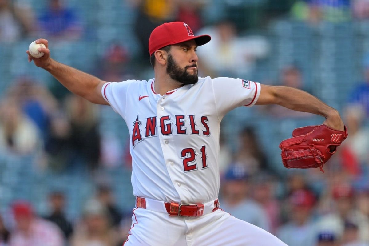 May 22, 2026; Anaheim, California, USA;  Los Angeles Angels pitcher Grayson Rodriguez (21) delivers to the plate during the first inning against the Texas Rangers at Angel Stadium. Mandatory Credit: Jayne Kamin-Oncea-Imagn Images