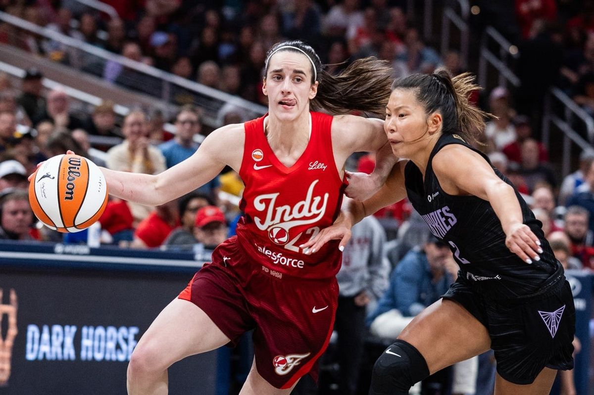 May 22, 2026; Indianapolis, Indiana, USA;  Indiana Fever guard Caitlin Clark (22) dribbles the ball while Golden State Valkyries guard Kaitlyn Chen (2) defends in the second half at Gainbridge Fieldhouse. Mandatory Credit: Trevor Ruszkowski-Imagn Images