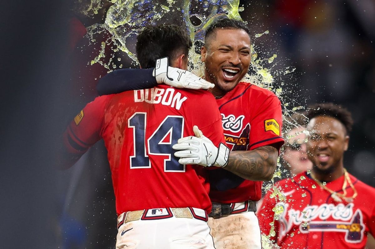 May 22, 2026; Atlanta, Georgia, USA; Atlanta Braves catcher Chadwick Tromp (39) celebrates with left fielder Mauricio Dubon (14) after a walk-off single against the Washington Nationals in the eleventh inning at Truist Park. Mandatory Credit: Brett Davis-Imagn Images