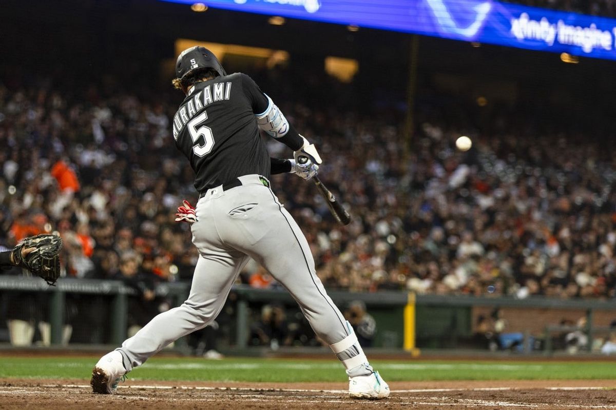 May 22, 2026; San Francisco, California, USA;  Chicago White Sox first baseman Munetaka Murakami (5) hits a three-run double against the San Francisco Giantsduring the fourth inning at Oracle Park. Mandatory Credit: John Hefti-Imagn Images