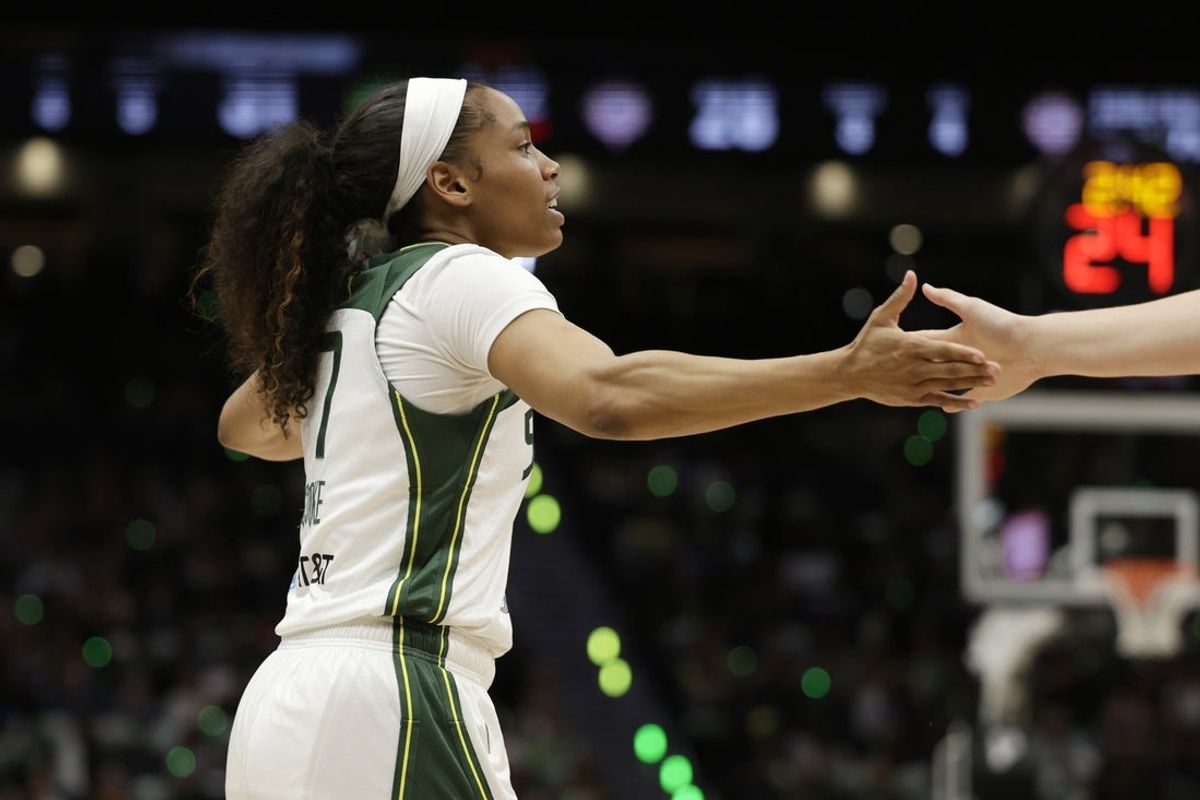May 22, 2026; Seattle, Washington, USA; Seattle Storm guard Zia Cooke (7) is congratulated after a score against the Connecticut Sun during the first half at Climate Pledge Arena. Mandatory Credit: John Froschauer-Imagn Images