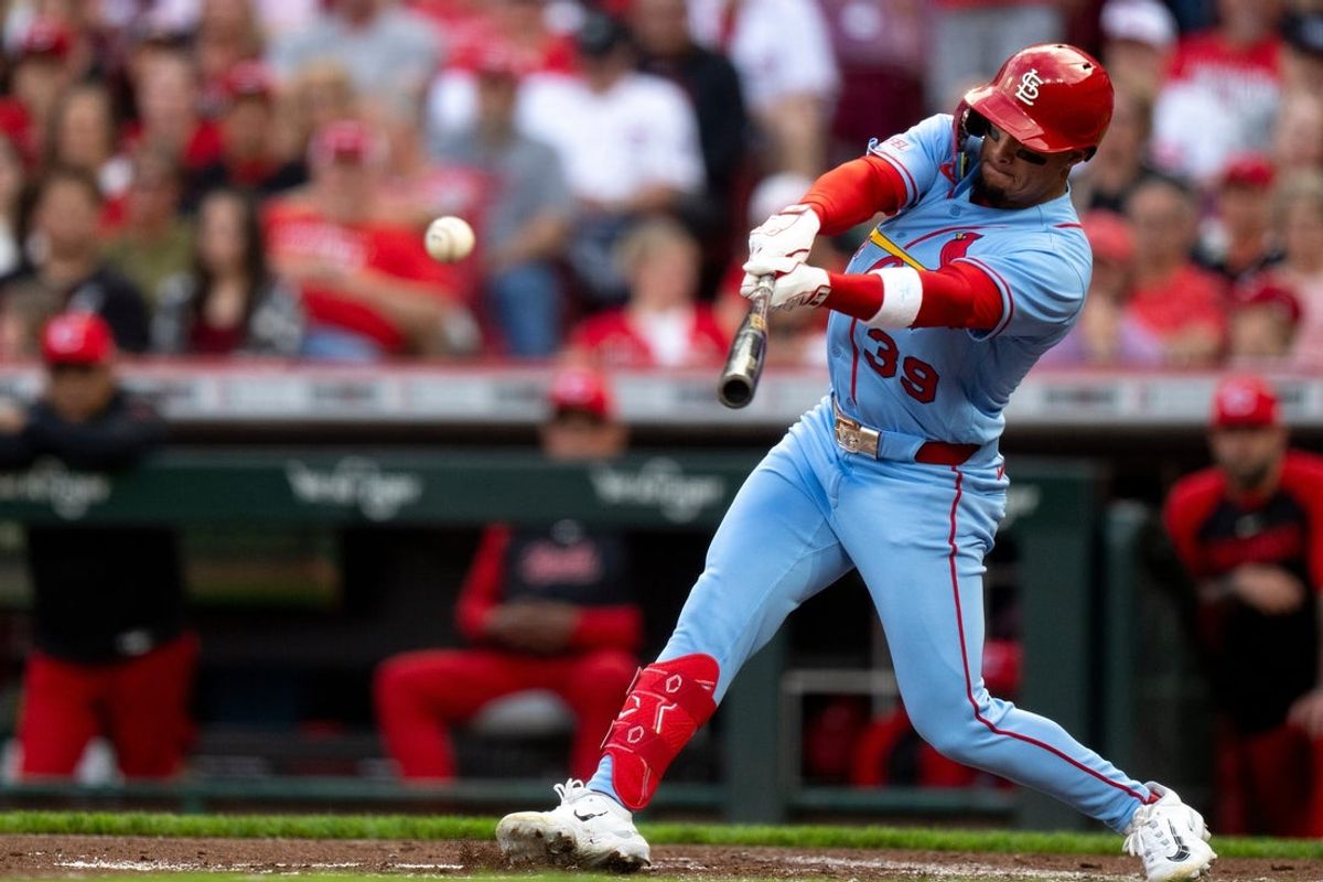St. Louis Cardinals left fielder Bryan Torres (39) hits a base hit in the second inning between the St. Louis Cardinals and Cincinnati Reds at Great American Ball Park in Cincinnati on Saturday, May 23, 2026.