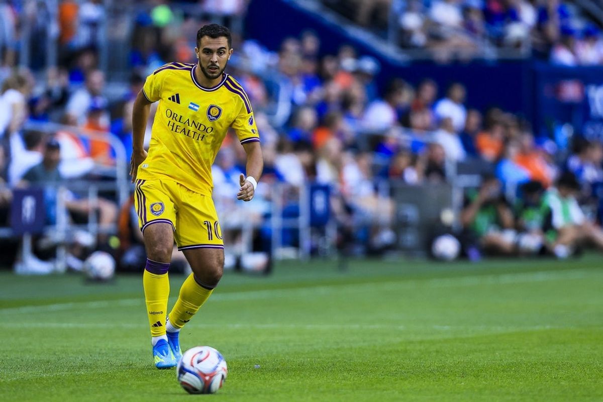 May 23, 2026; Cincinnati, Ohio, USA; Orlando City SC midfielder Martin Ojeda (10) dribbles against FC Cincinnati in the first half at TQL Stadium. Mandatory Credit: Katie Stratman-Imagn Images