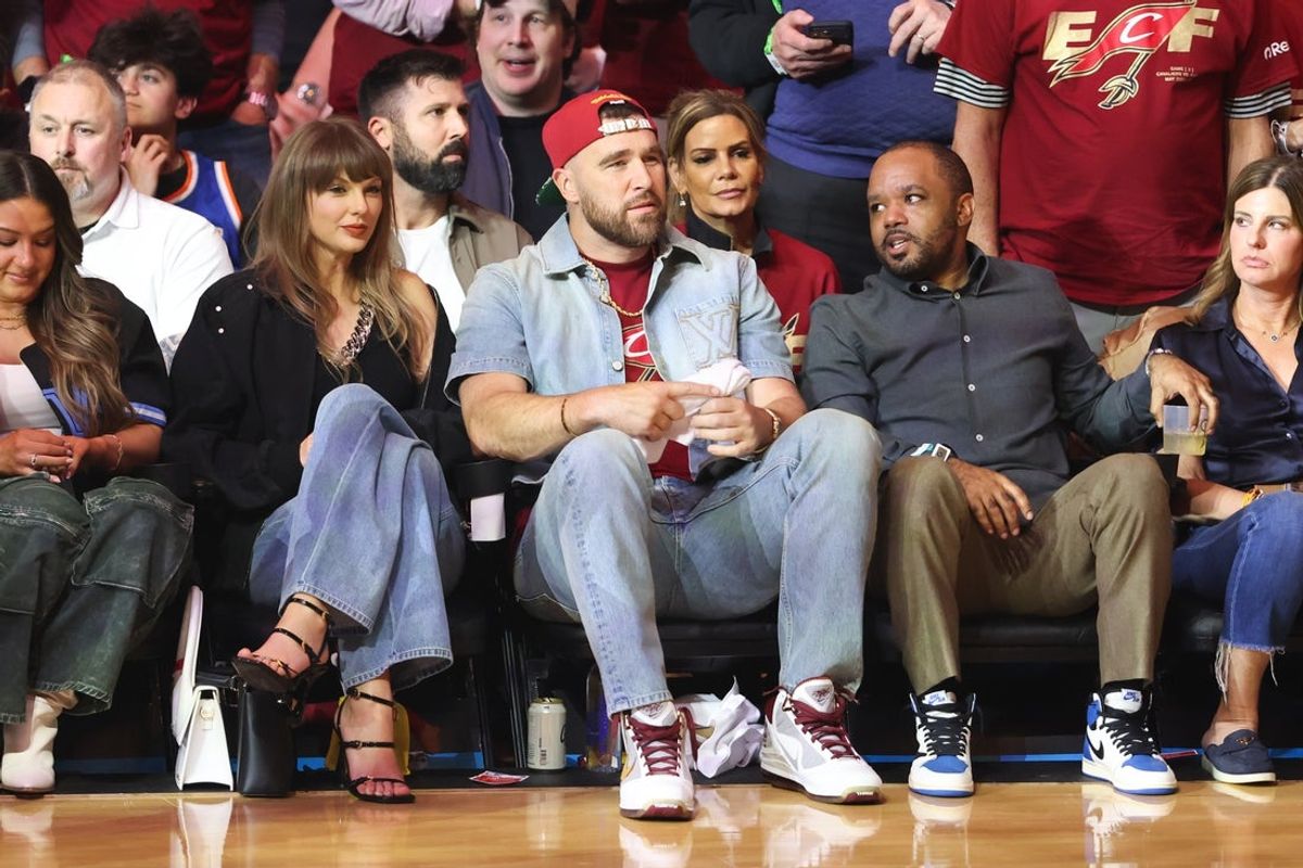 May 23, 2026; Cleveland, Ohio, USA; Taylor Swift and Travis Kelce look on during Game 3 of the Eastern Conference finals for the 2026 NBA playoffs between the New York Knicks and Cleveland Cavaliers at Rocket Arena. Mandatory Credit: Scott Galvin-Imagn Images