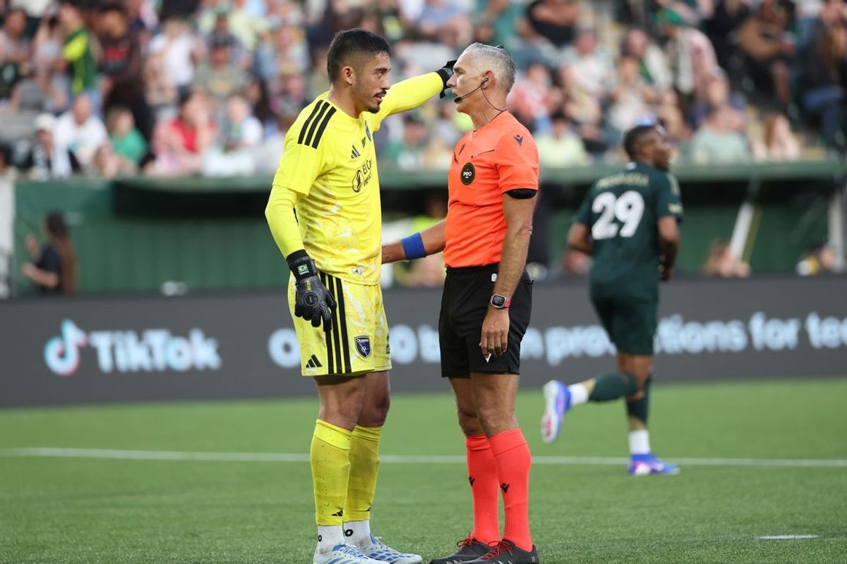 May 23, 2026; Portland, Oregon, USA;  San Jose Earthquakes goalkeeper Daniel de Sousa Britto (42) talks with the referee during the second half against the Portland Timbers at Providence Park. Mandatory Credit: Jaime Valdez-Imagn Images