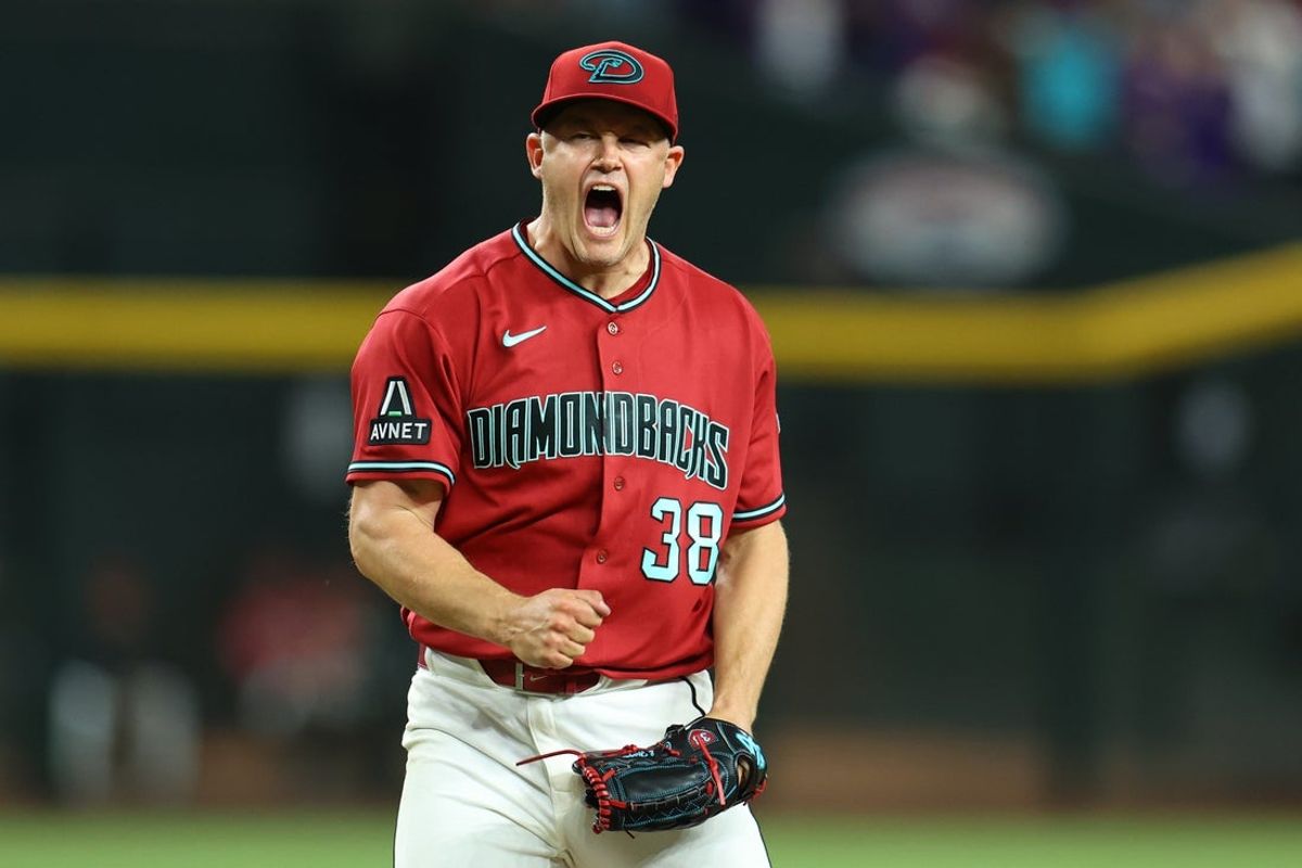 May 23, 2026; Phoenix, Arizona, USA; Arizona Diamondbacks relief pitcher Paul Sewald (38) reacts after defeating the Colorado Rockies in the ninth inning at Chase Field. Mandatory Credit: Anna Carrington-Imagn Images