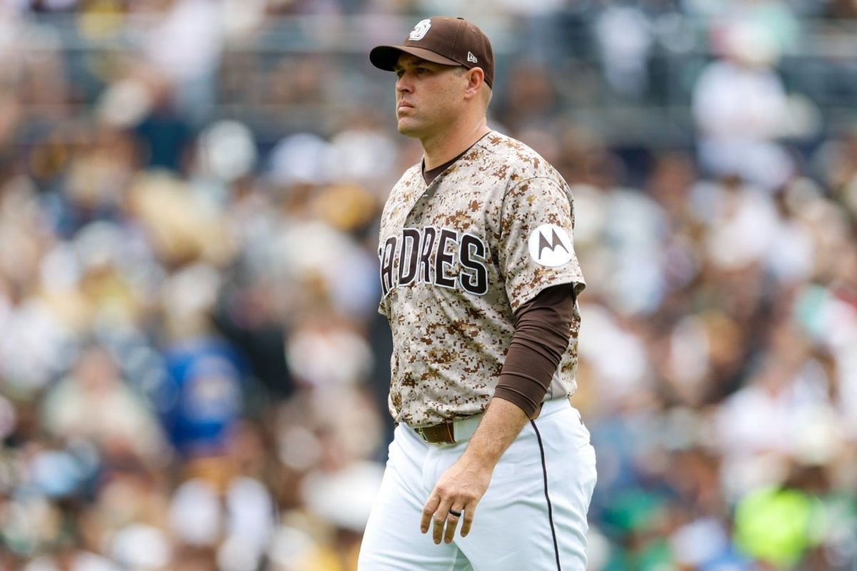 May 24, 2026; San Diego, California, USA; San Diego Padres manager Craig Stammen (14) walks off the field during the fourth inning against the Athletics at Petco Park. Mandatory Credit: David Frerker-Imagn Images