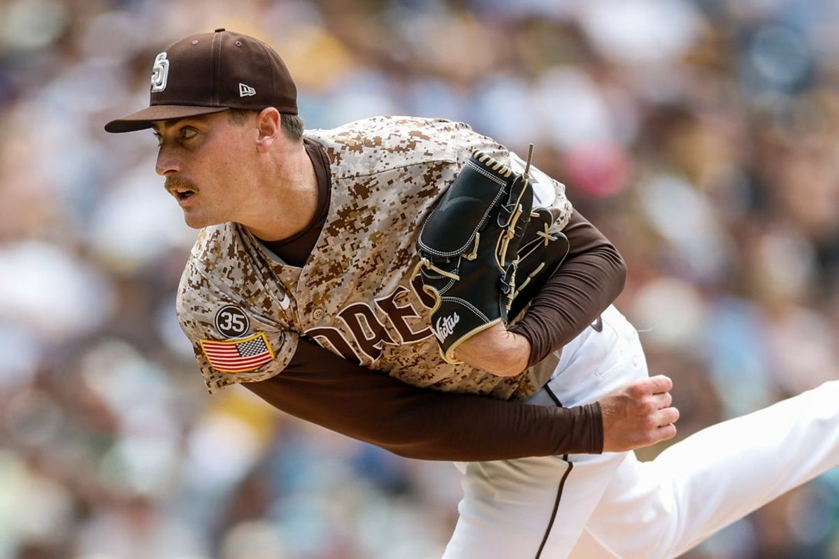 May 24, 2026; San Diego, California, USA; San Diego Padres relief pitcher Ron Marinaccio (97) throws a pitch during the fourth inning against the Athletics at Petco Park. Mandatory Credit: David Frerker-Imagn Images
