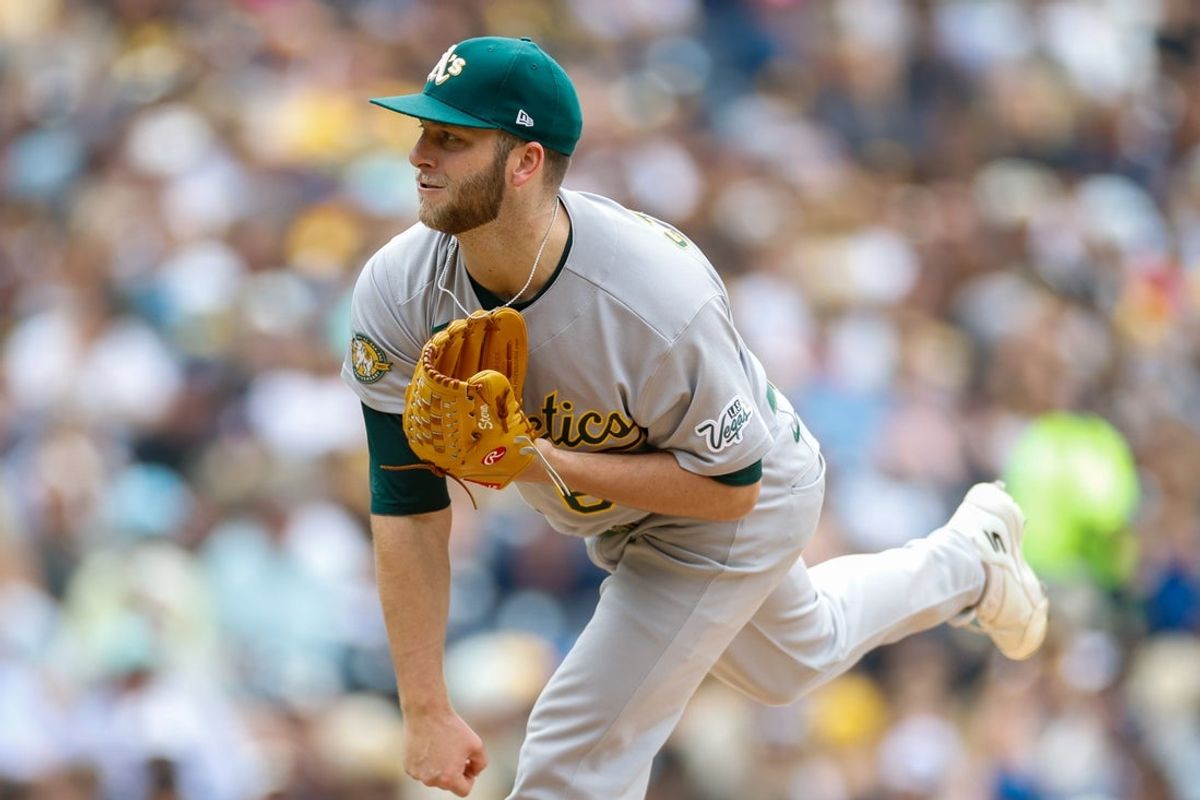 May 24, 2026; San Diego, California, USA; Athletics relief pitcher Justin Sterner (60) throws a pitch during the seventh inning against the San Diego Padres at Petco Park. Mandatory Credit: David Frerker-Imagn Images