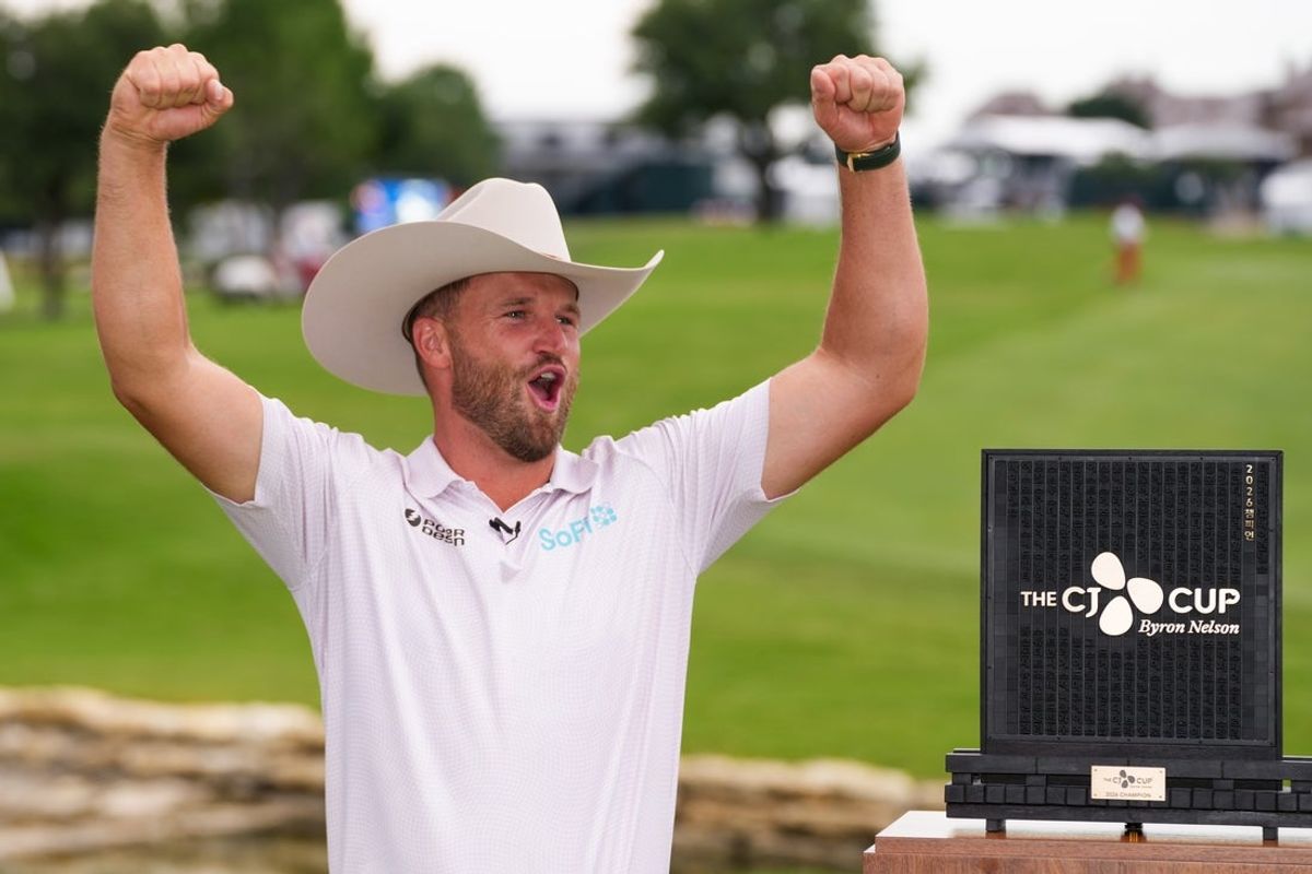 May 24, 2026; McKinney, Texas, USA; Wyndham Clark celebrates by wearing winner’s Stetson 100x silver belly cowboy hat alongside the CJ CUP trophy after winning THE CJ CUP Byron Nelson golf tournament. Mandatory Credit: Raymond Carlin III-Imagn Images
