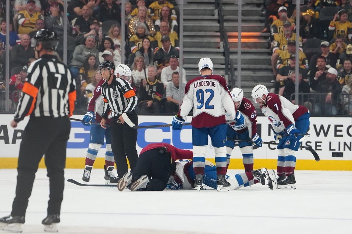 May 24, 2026; Las Vegas, Nevada, USA; Colorado Avalanche center Nathan MacKinnon (29) receives medical during the second period against the Vegas Golden Knights in game three of the Western Conference Final of the 2026 Stanley Cup Playoffs at T-Mobile Arena. Mandatory Credit: Stephen R. Sylvanie-Imagn Images