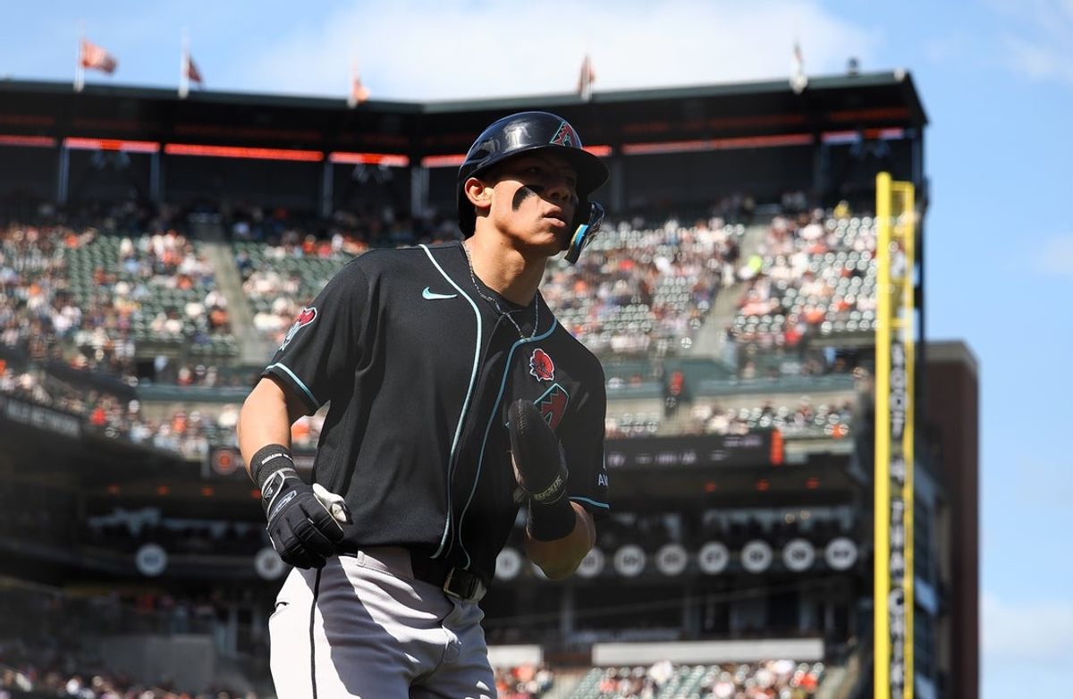 May 25, 2026; San Francisco, California, USA; Arizona Diamondbacks first baseman Jose Fernandez (11) jogs home after being batted in on a two-run RBI single by second baseman Ketel Marte (not pictured) during the sixth inning against the San Francisco Giants at Oracle Park. Mandatory Credit: Kelley L Cox-Imagn Images