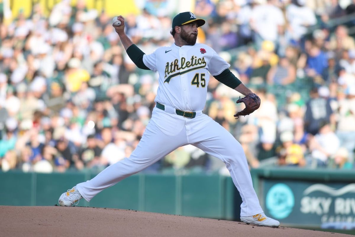 Athletics pitcher Aaron Civale throws to a Seattle Mariners batter during the first inning at Sutter Health Park.