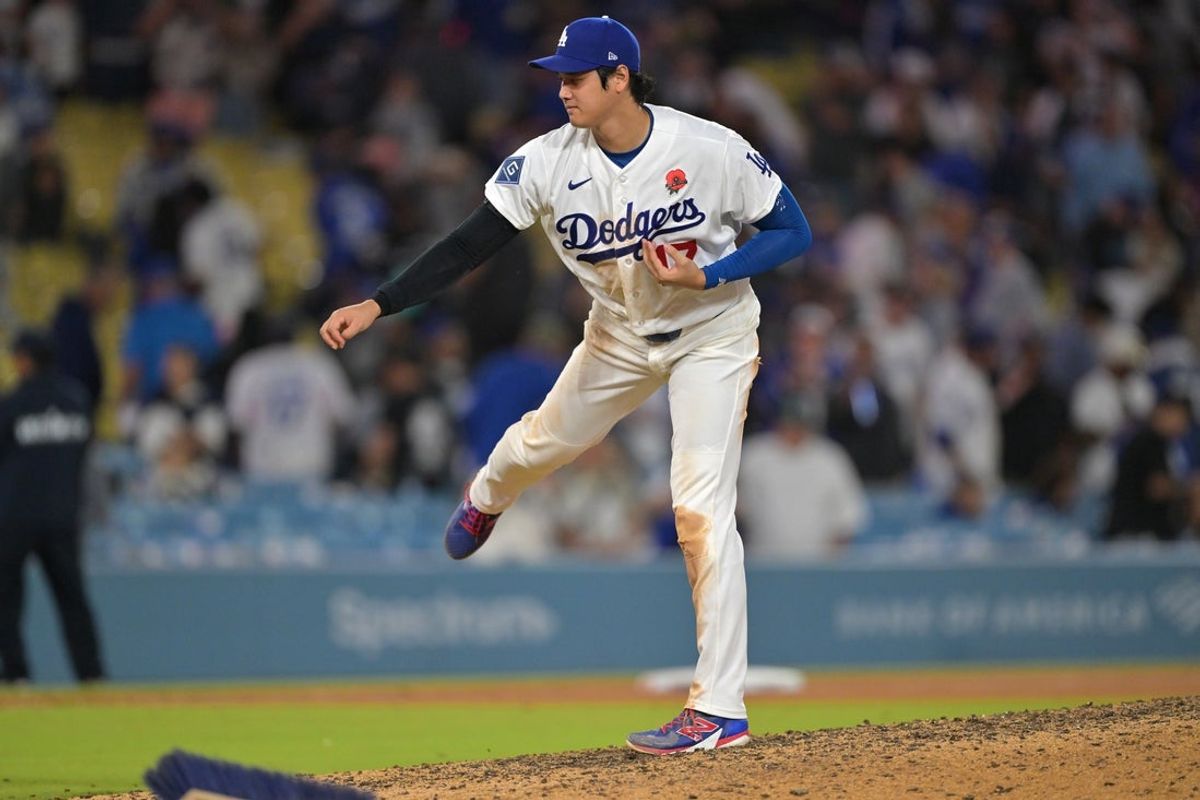 May 25, 2026; Los Angeles, California, USA;  Los Angeles Dodgers starting pitcher Shohei Ohtani (17) steps on to the mound and goes through his pitching motion after the final out of the ninth inning against the Colorado Rockies at Dodger Stadium. Mandatory Credit: Jayne Kamin-Oncea-Imagn Images