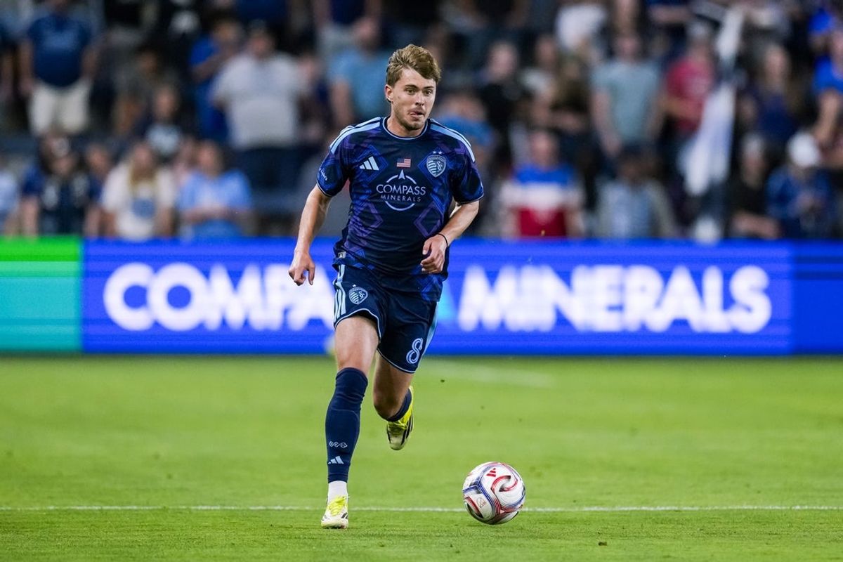 May 23, 2026; Kansas City, Kansas, USA; Sporting Kansas City midfielder Jake Davis (8) controls the ball during the second half against Red Bull New York at Children's Mercy Park. Mandatory Credit: Jay Biggerstaff-Imagn Images