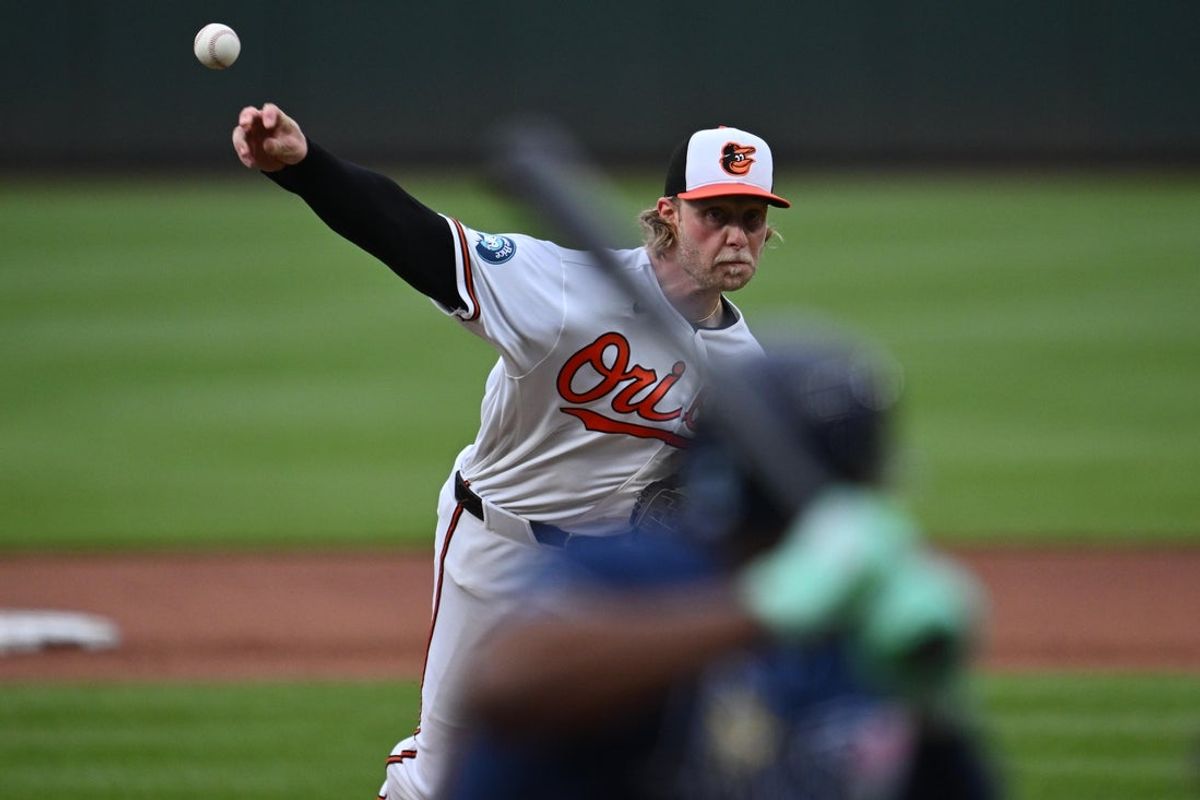 May 26, 2026; Baltimore, Maryland, USA;  Baltimore Orioles pitcher Shane Baz (34) pitches in the first inning against the Tampa Bay Rays at Oriole Park at Camden Yards. Mandatory Credit: Jamie Sabau-Imagn Images