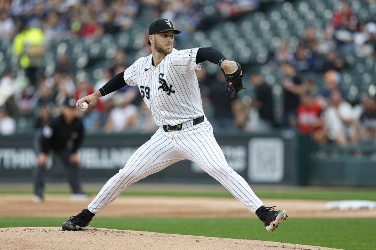 May 26, 2026; Chicago, Illinois, USA; Chicago White Sox starting pitcher Sean Burke (59) delivers a pitch against the Minnesota Twins during the first inning at Rate Field. Mandatory Credit: Kamil Krzaczynski-Imagn Images