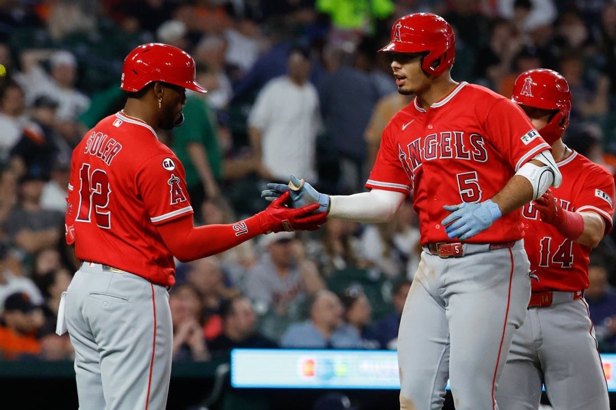 May 26, 2026; Detroit, Michigan, USA;  Los Angeles Angels second baseman Vaughn Grissom (5) receives congratulations from designated hitter Jorge Soler (12) after he hits a grand slam in the eighth inning against the Detroit Tigers at Comerica Park. Mandatory Credit: Rick Osentoski-Imagn Images