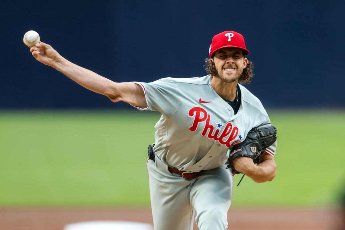 May 26, 2026; San Diego, California, USA; Philadelphia Phillies starting pitcher Aaron Nola (27) throws a pitch during the first inning against the San Diego Padres at Petco Park. Mandatory Credit: David Frerker-Imagn Images