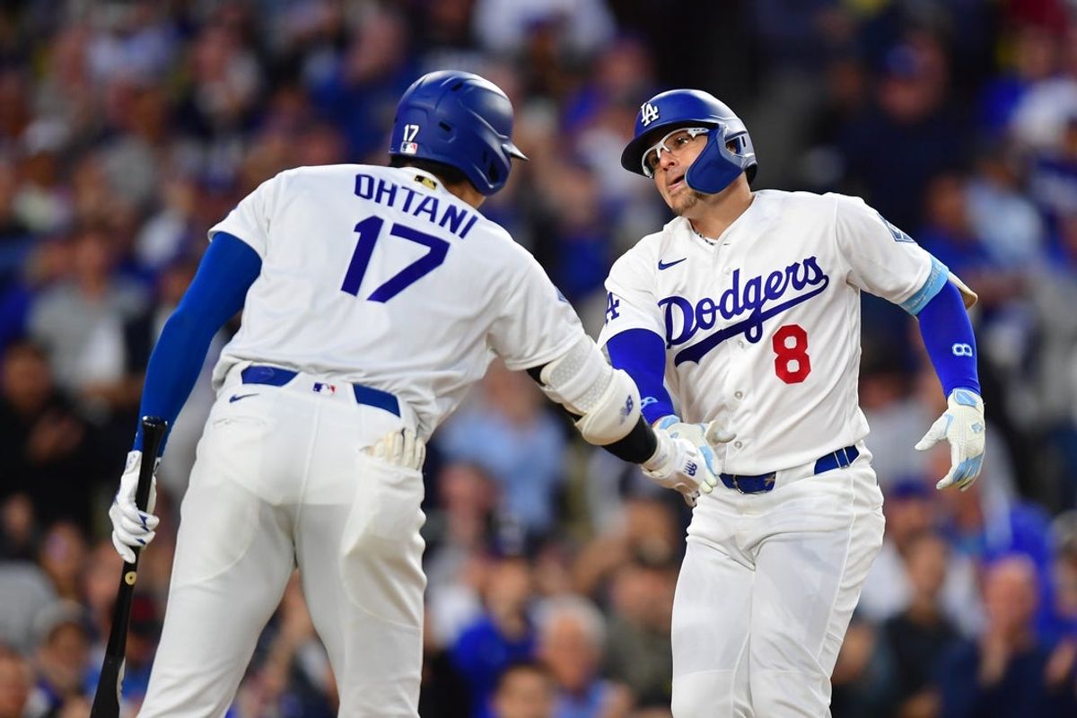 May 26, 2026; Los Angeles, California, USA;  Los Angeles Dodgers first baseman Enrique Hernandez (8) celebrates with Los Angeles Dodgers two-way player Shohei Ohtani (17) after hitting a solo home run during the third inning against the Colorado Rockies at Dodger Stadium. Mandatory Credit: Gary A. Vasquez-Imagn Images
