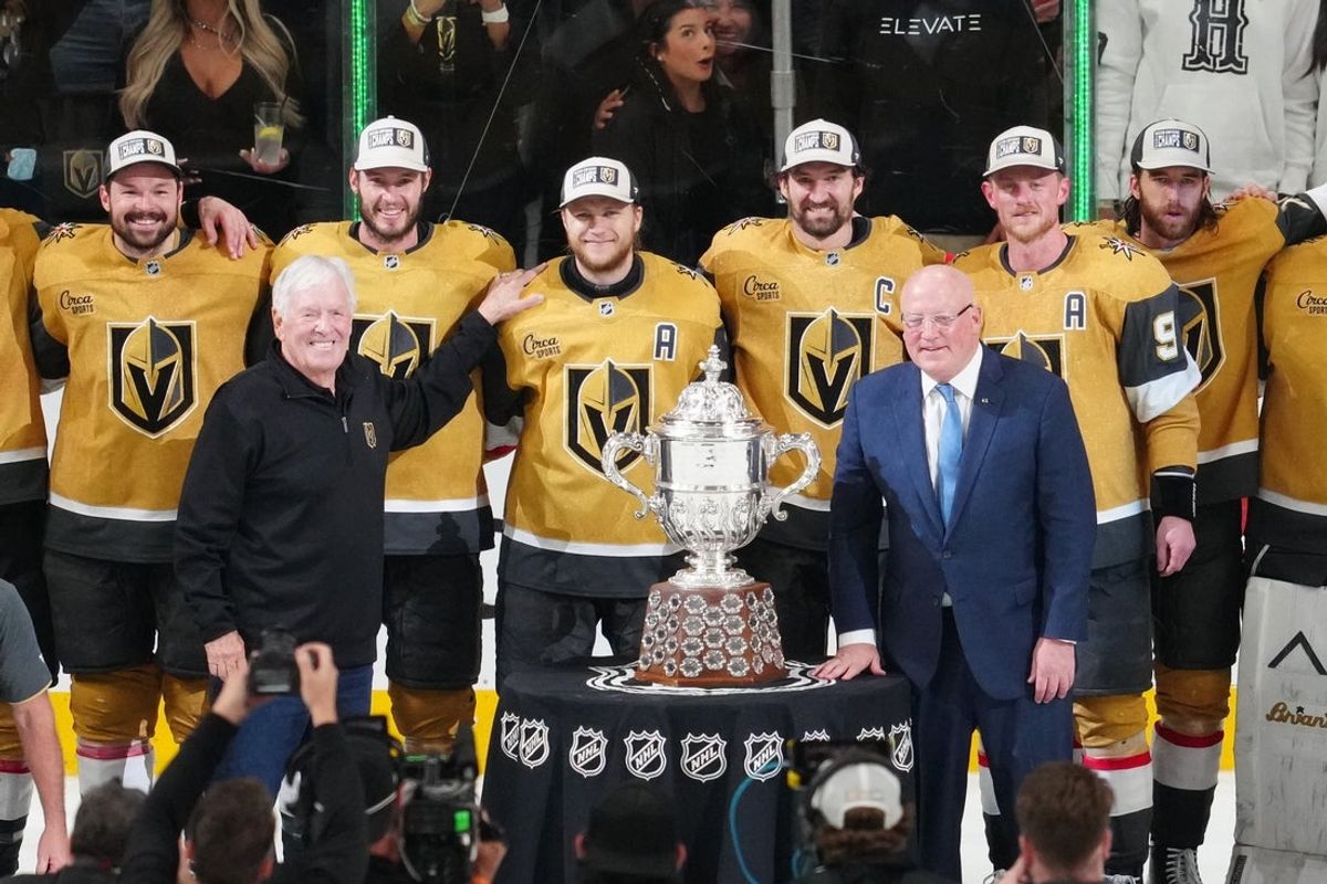 May 26, 2026; Las Vegas, Nevada, USA; Vegas Golden Knights and primary owner of the Vegas Golden Knights Bill Foley are presented with the Clarence S. Campbell Bowl by Deputy commissioner of the NHL Bill Daly after winning against the Colorado Avalanchein game four of the Western Conference Final of the 2026 Stanley Cup Playoffs at T-Mobile Arena. Mandatory Credit: Stephen R. Sylvanie-Imagn Images