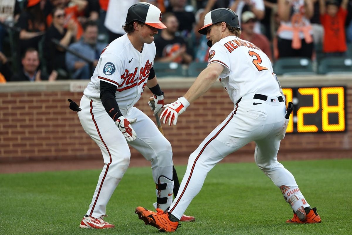 May 27, 2026; Baltimore, Maryland, USA; Baltimore Orioles shortstop Gunnar Henderson (2) celebrates with Baltimore Orioles catcher Adley Rutschman (35) after hitting a home run during the first inning against the Tampa Bay Rays at Oriole Park at Camden Yards. Mandatory Credit: Daniel Kucin Jr.-Imagn Images