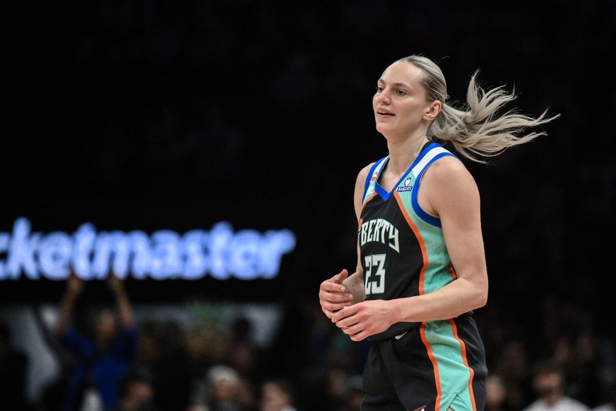 May 27, 2026; Brooklyn, New York, USA; New York Liberty guard Marine Johannes (23) reacts after scoring a basket against the Phoenix Mercury during the first half at Barclays Center. Mandatory Credit: John Jones-Imagn Images