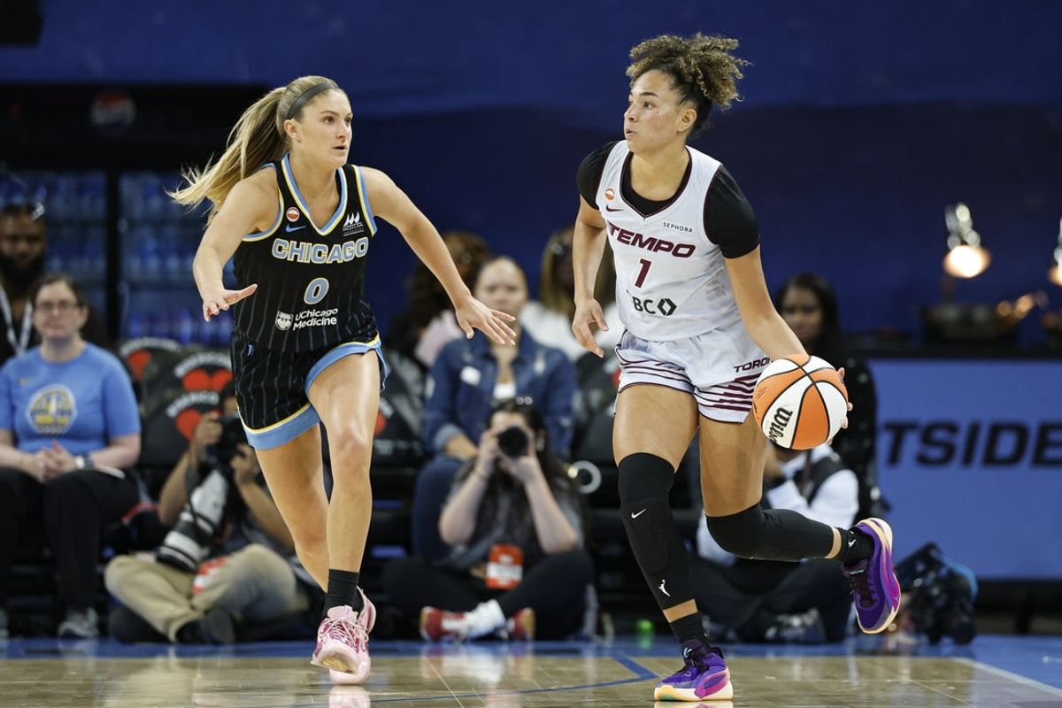 May 27, 2026; Chicago, Illinois, USA; Chicago Sky guard Jacy Sheldon (0) defends against Toronto Tempo guard Kiki Rice (1) during the first half at Wintrust Arena. Mandatory Credit: Kamil Krzaczynski-Imagn Images