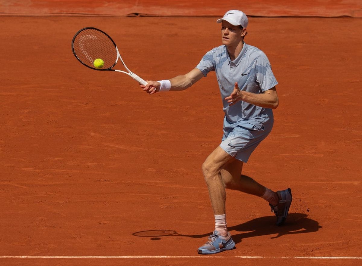 May 28, 2026; Paris, France; Jannik Sinner of Italy returns a shot during his match against Juan Manuel Cerundolo of Argentina on day five at Stade Roland Garros. Mandatory Credit: Susan Mullane-Imagn Images