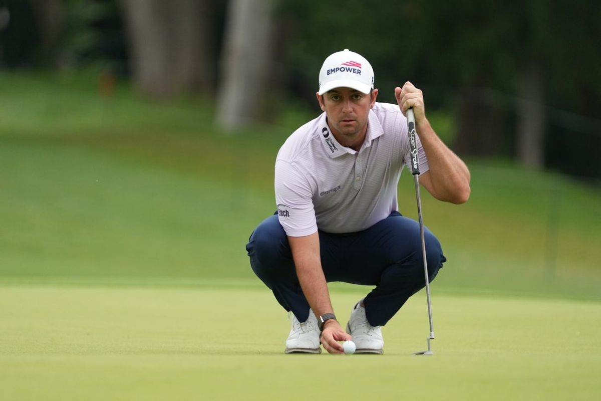 May 28, 2026; Fort Worth, Texas, USA; Davis Riley lines up a putt on the seventh green during the first round of the Charles Schwab Challenge golf tournament. Mandatory Credit: Raymond Carlin III-Imagn Images