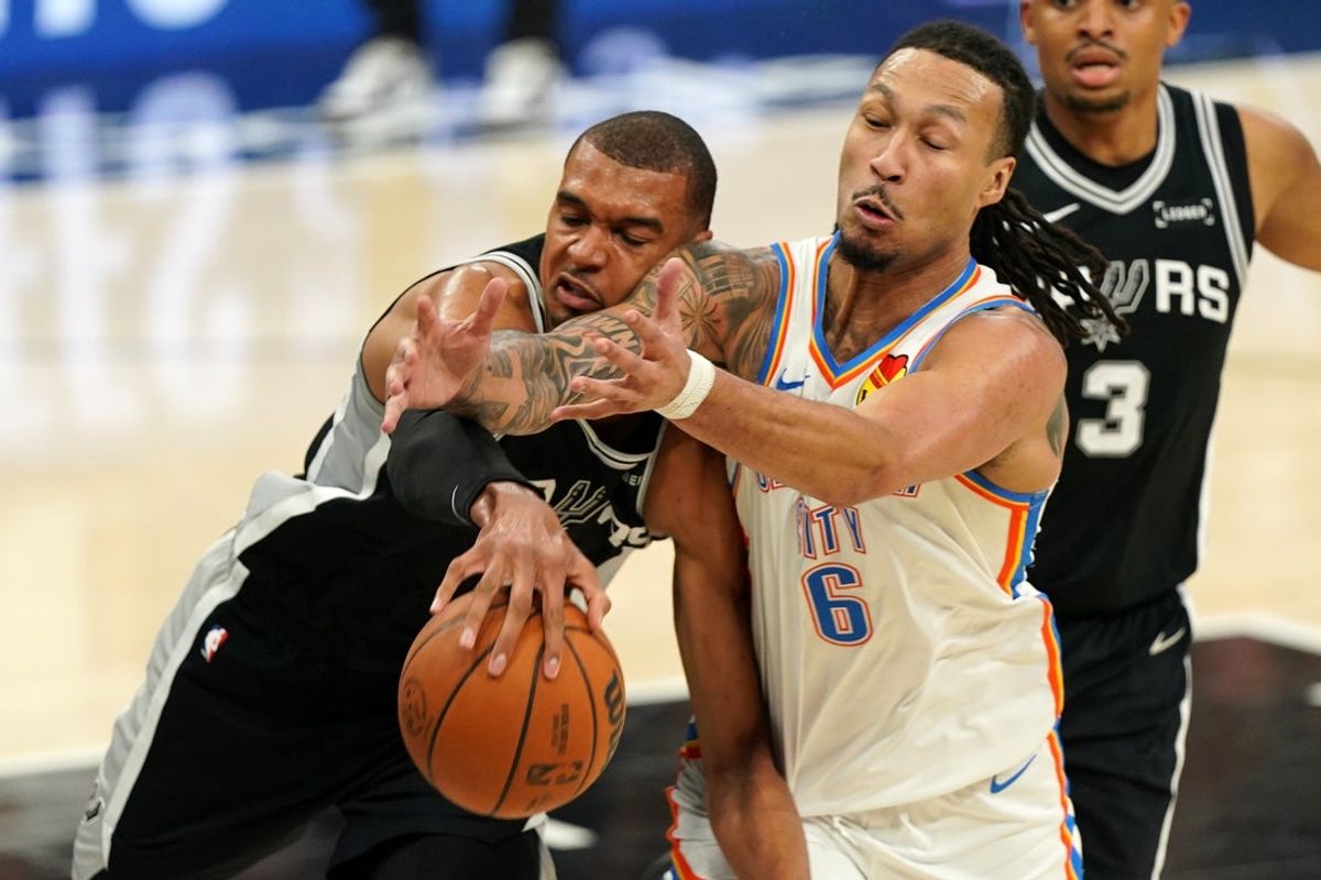 May 28, 2026; San Antonio, Texas, USA; San Antonio Spurs forward Victor Wembanyama (1) and Oklahoma City Thunder forward Jaylin Williams (6) attempt to get a loose ball in the second half during game six of the western conference finals for the 2026 NBA playoffs at Frost Bank Center. Mandatory Credit: Dustin Safranek-Imagn Images